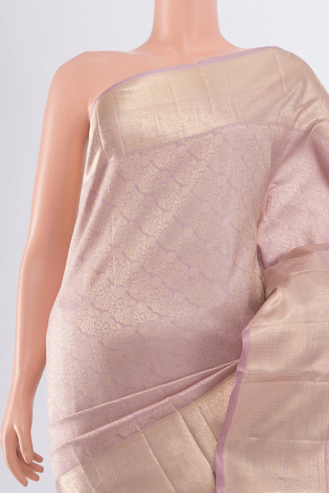 Border image of Pure Silk Pure Zari Lavender Kanjivaram Saree with Zari Butta on the body and Silk Border. 