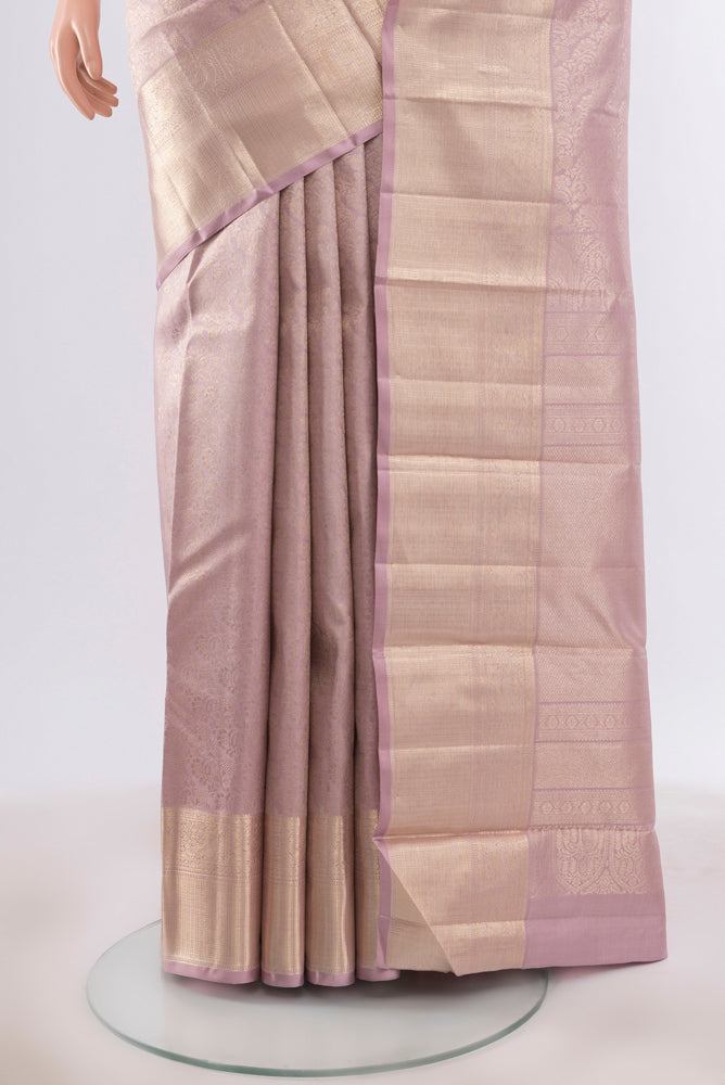 Pleats and pallu of Pure Silk Pure Zari Lavender Kanjivaram Saree with Zari Butta on the body and Silk Border. 