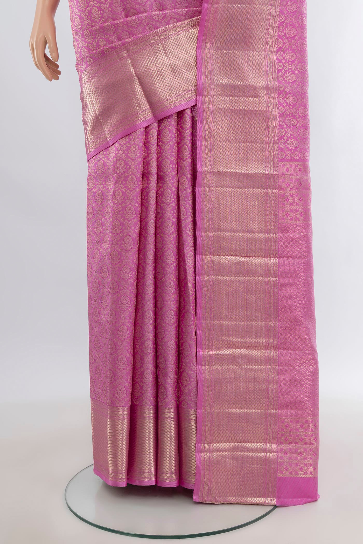 Pleats and pallu of Rose pink Kanjivaram Silk Saree with Zari Brocade on the body and Zari Border. 