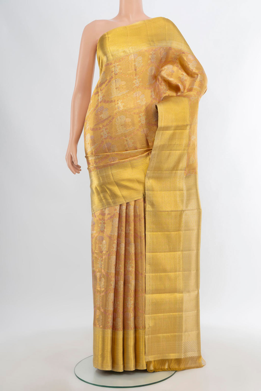 Pure Silk Pure Zari Golden Kanjivaram Tissue Saree with Zari Brocade on the body and Zari Border.  displayed on a mannequin