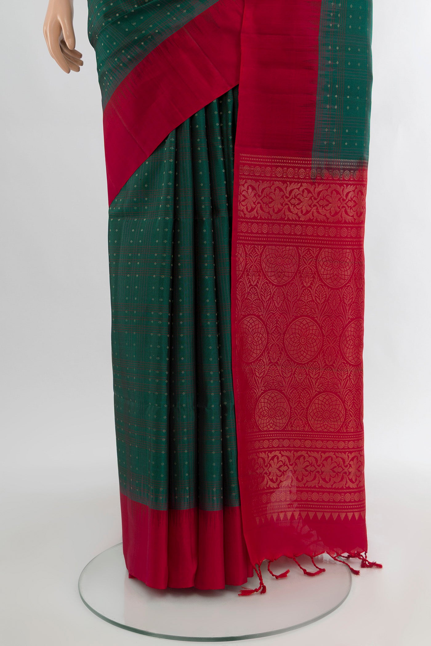 Pleats and pallu of Peacock Blue Soft Silk Saree with Zari Butta on the body and Silk Border. 