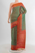 Multi Color Soft Silk Saree with Zari Butta on the body and Zari Border.  displayed on a mannequin