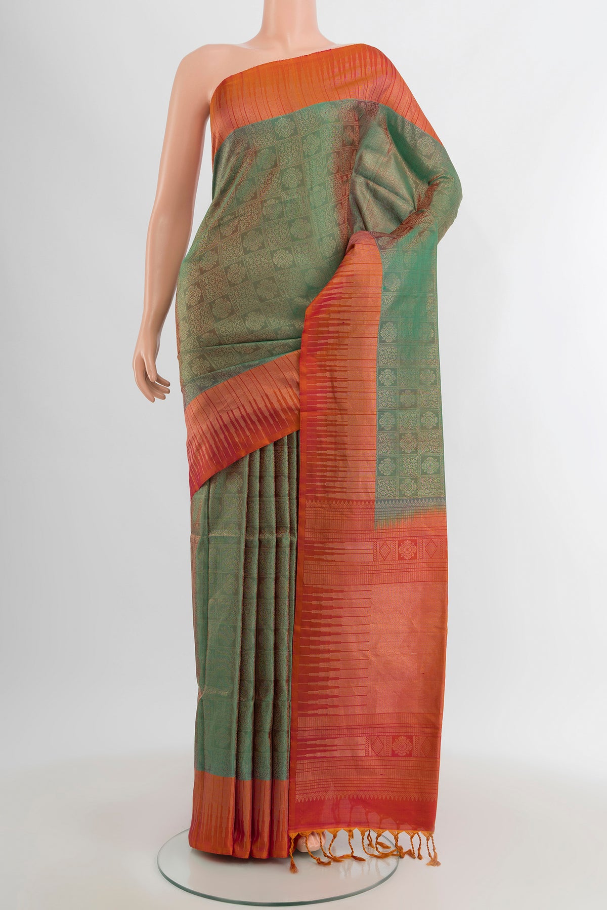 Multi Color Soft Silk Saree with Zari Butta on the body and Zari Border.  displayed on a mannequin
