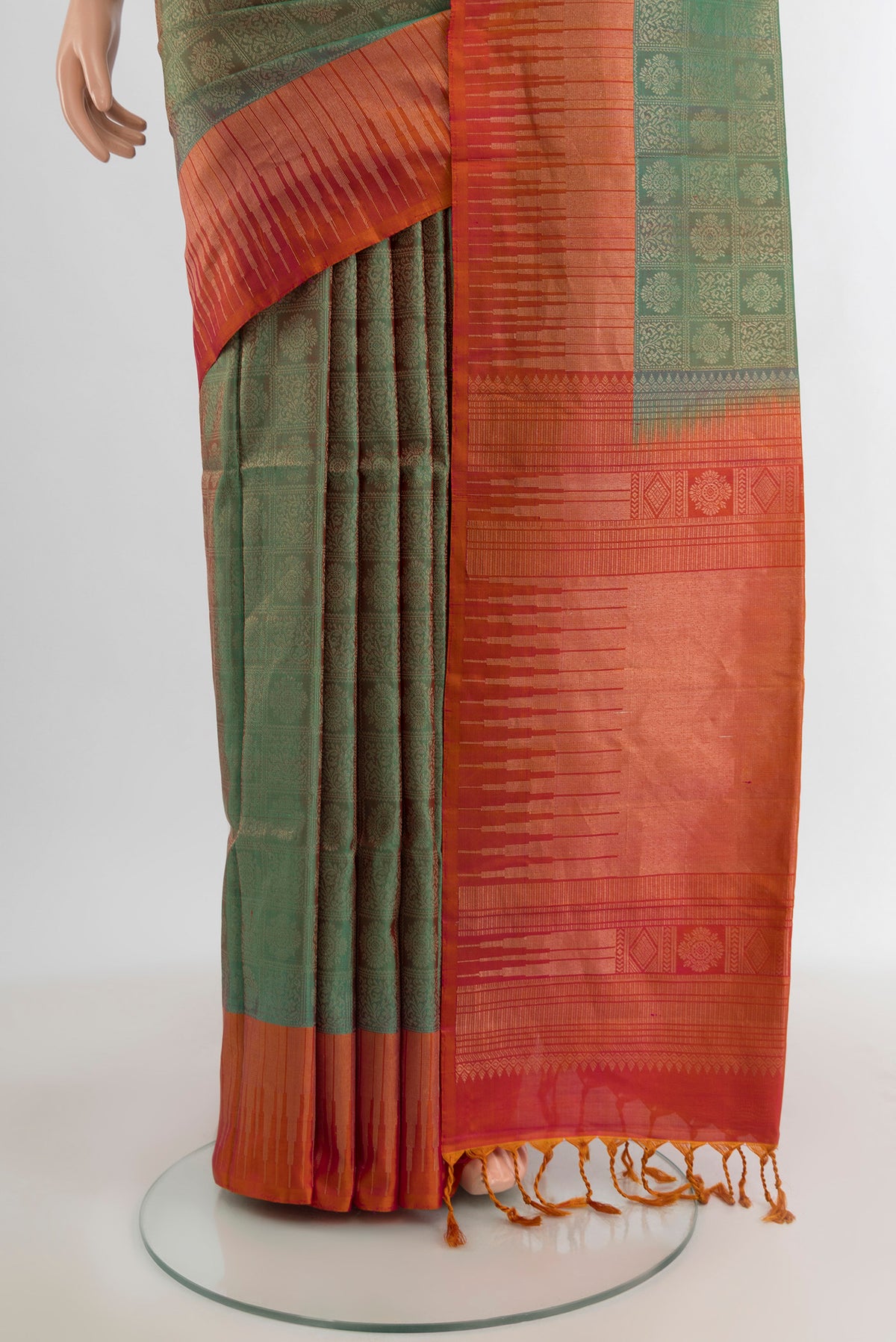 Pleats and pallu of Multi Color Soft Silk Saree with Zari Butta on the body and Zari Border. 