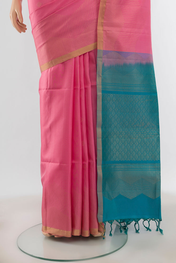 Pleats and pallu of Pure Silk Pure Zari Rose pink Soft Saree with Zari Butta on the body and Silk Border. 