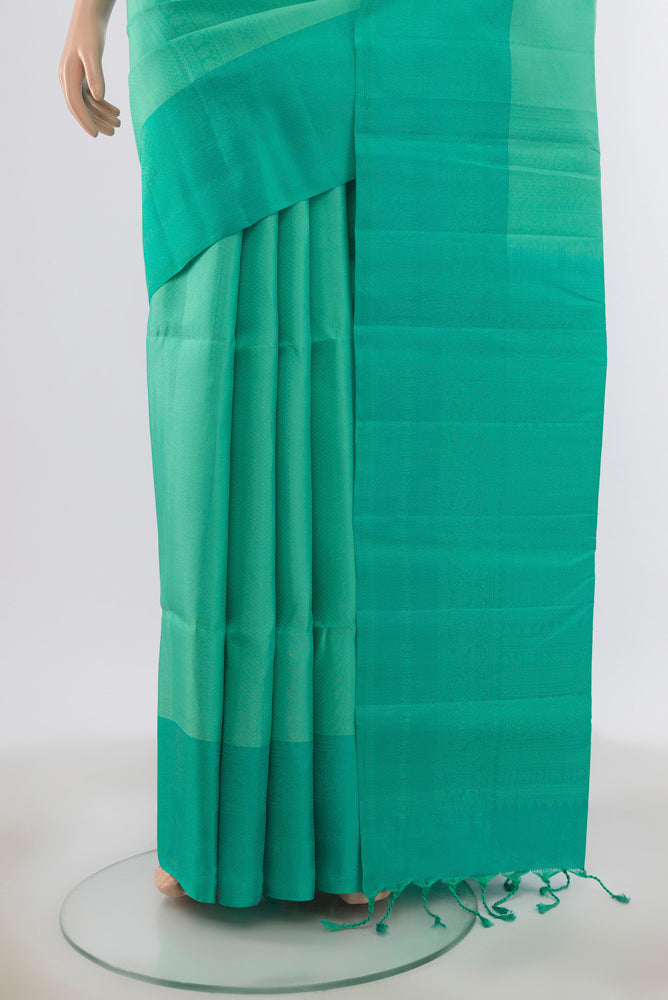 Pleats and pallu of Sky Blue Soft Silk Saree with Zari Butta on the body and Silk Border. 