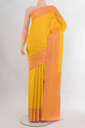 Pure Silk Yellow Soft Saree with Zari Butta on the body and Plain Border.  displayed on a mannequin