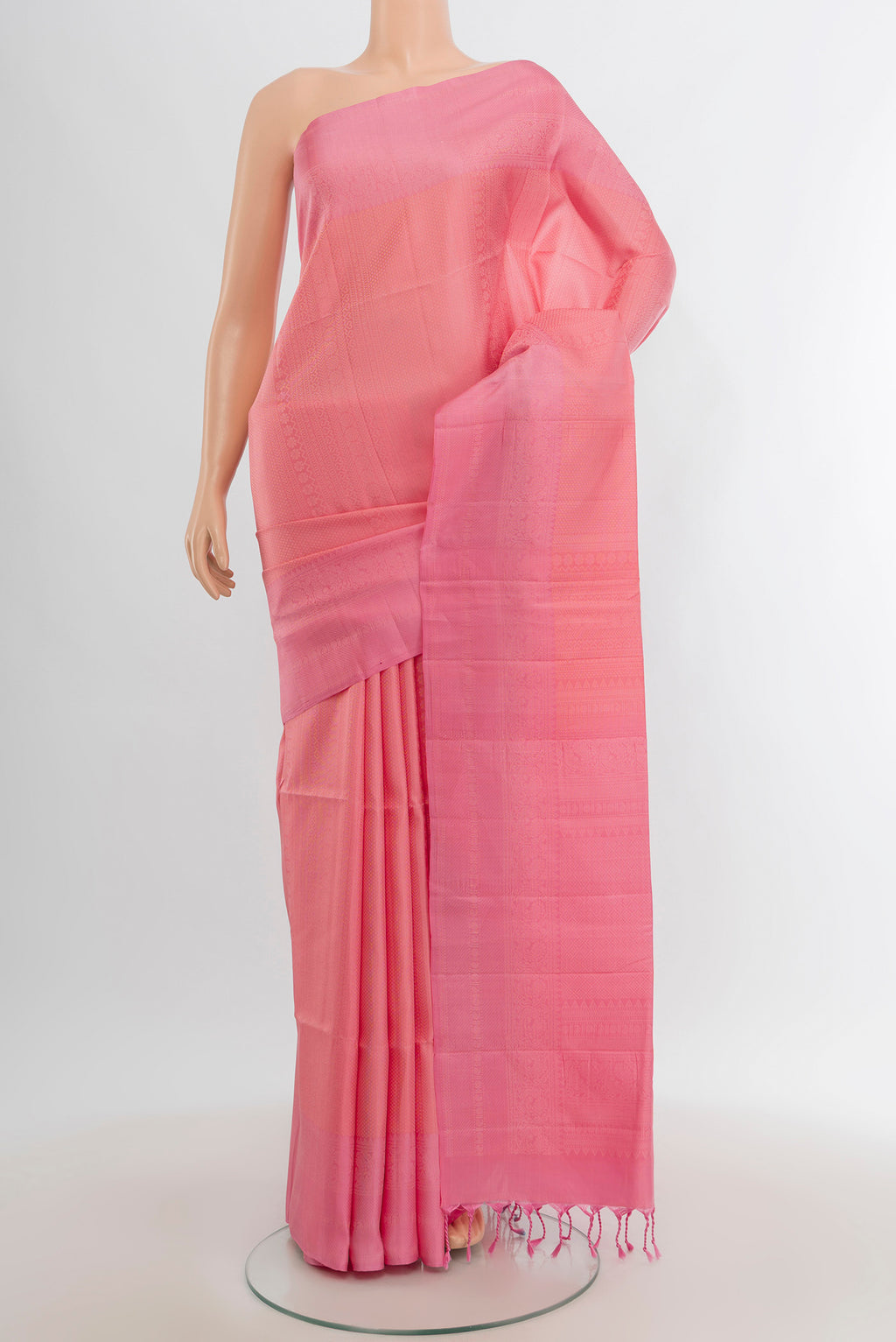Rose pink Soft Silk Saree with Zari Butta on the body and Thread Border.  displayed on a mannequin