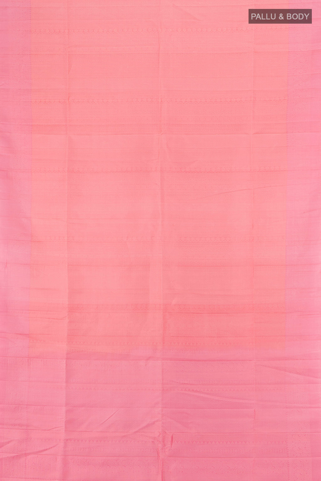 Flat view of Rose pink Soft Silk Saree with Zari Butta on the body and Thread Border. 