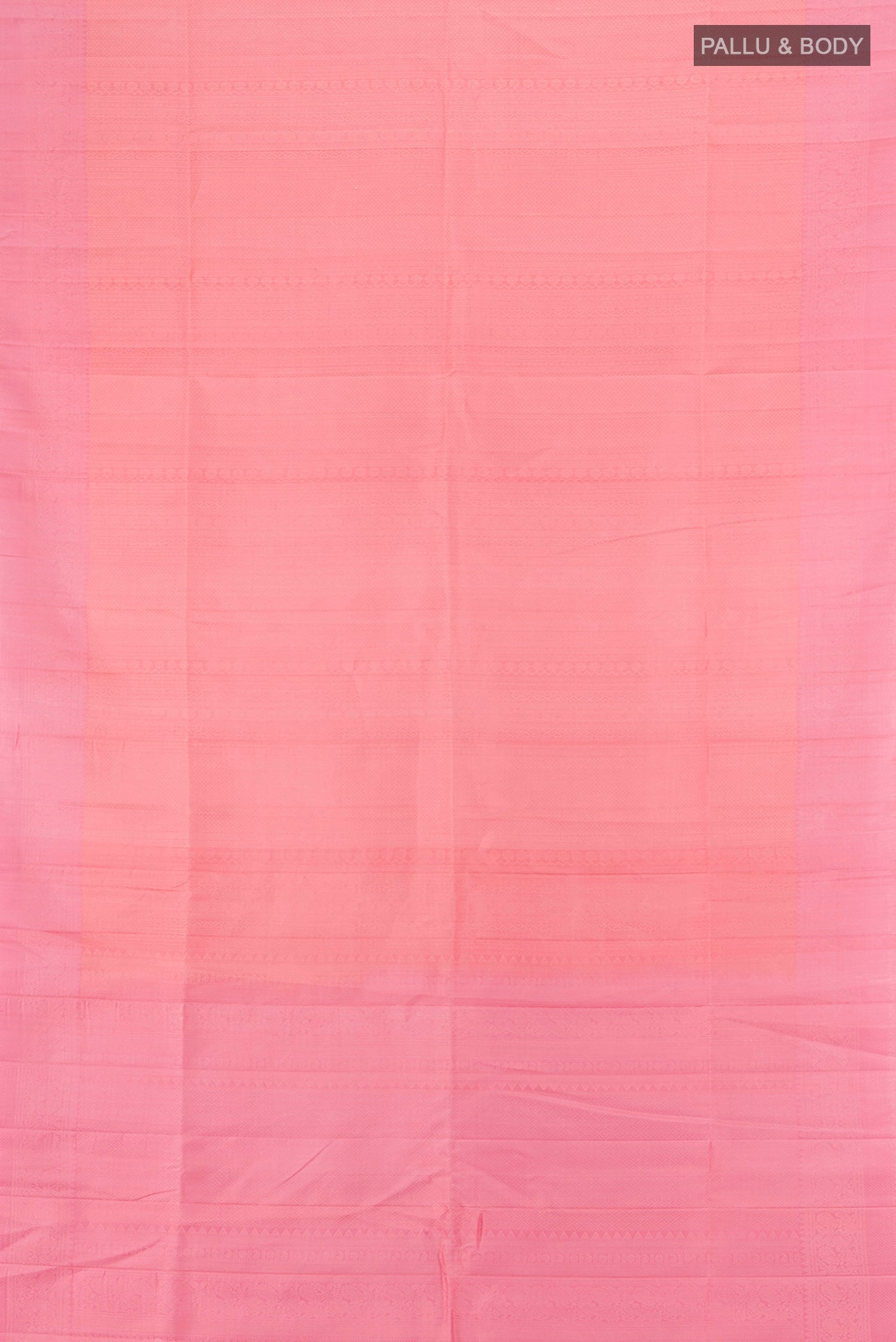 Flat view of Rose pink Soft Silk Saree with Zari Butta on the body and Thread Border. 