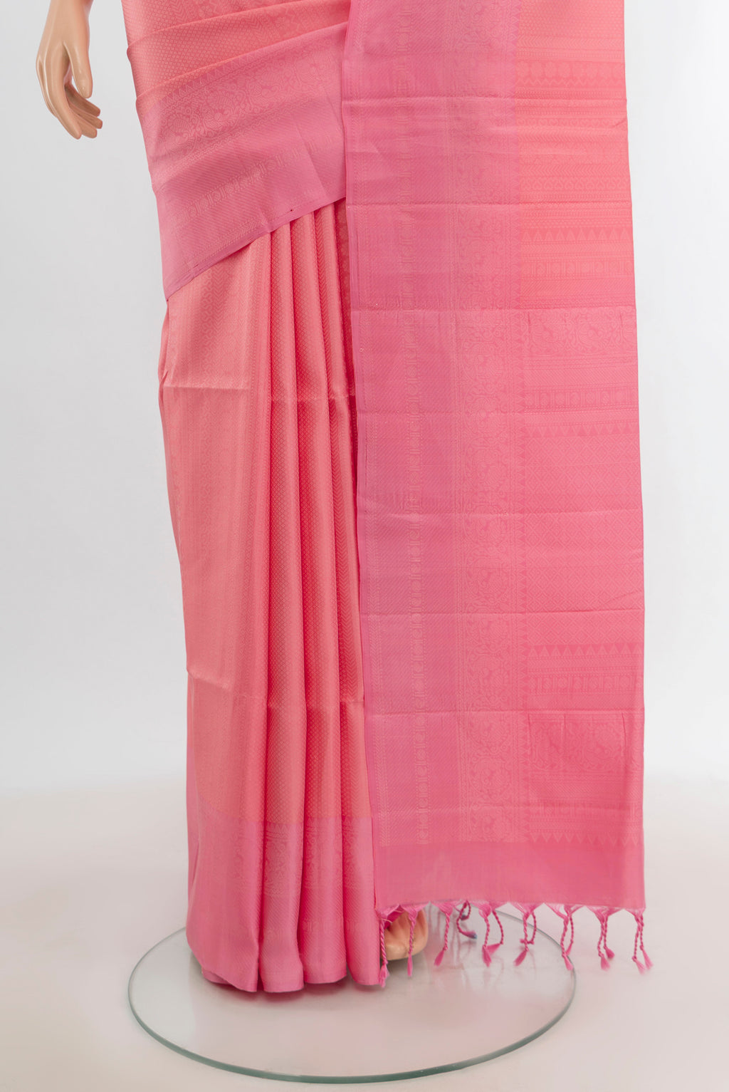 Pleats and pallu of Rose pink Soft Silk Saree with Zari Butta on the body and Thread Border. 