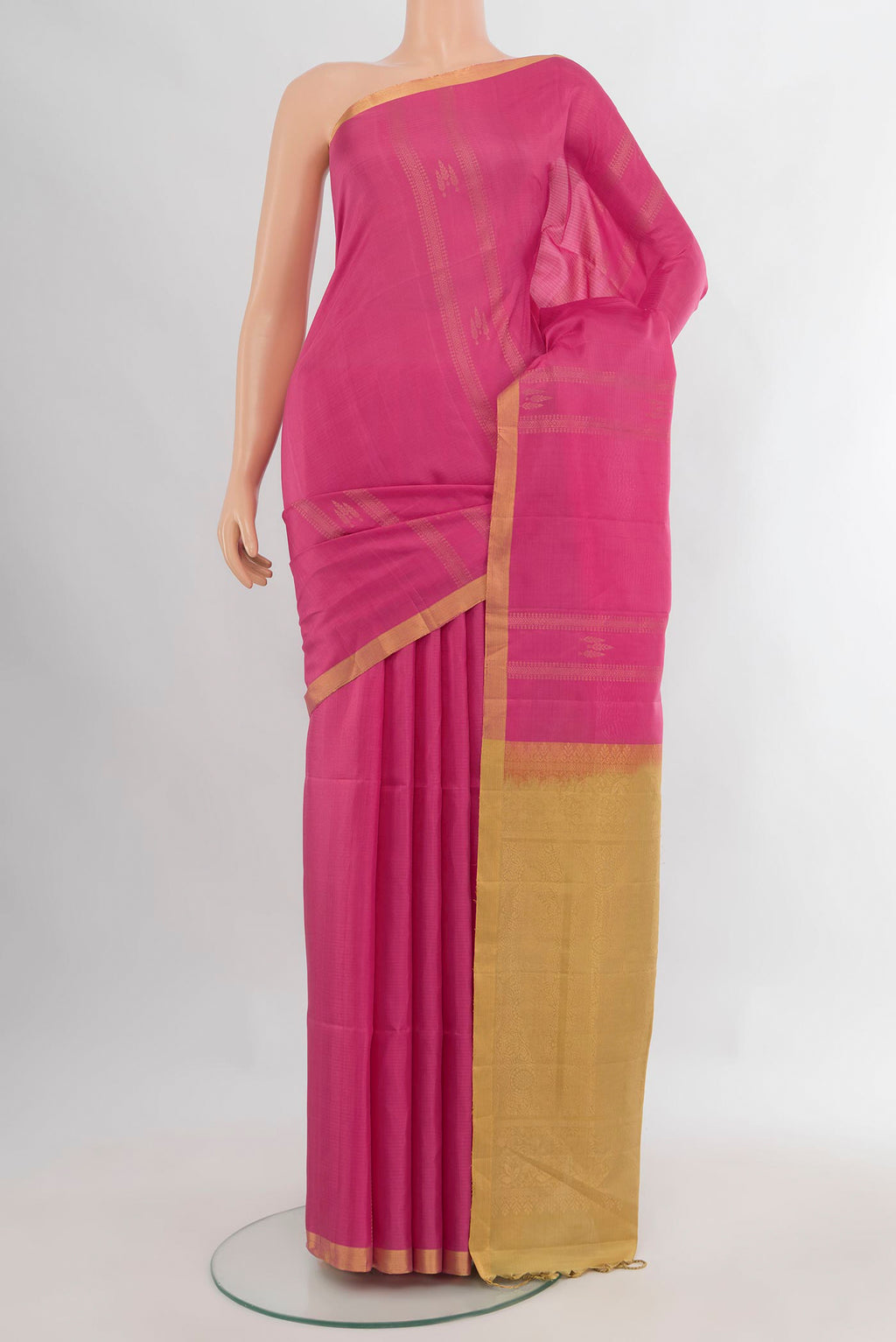 Pure Silk Pink Soft Saree with Stripes on the body and Zari Border.  displayed on a mannequin
