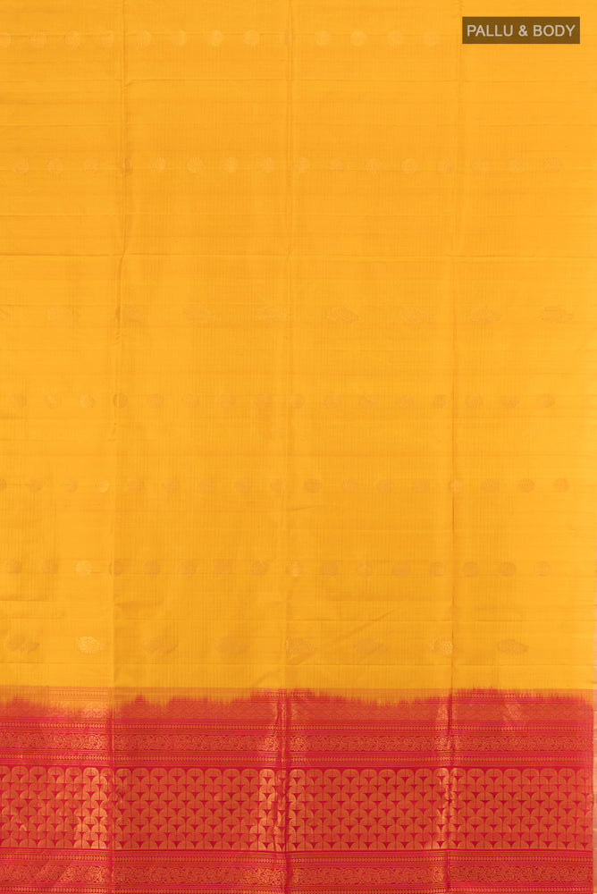 Flat view of Yellow Soft Silk Saree with Zari Butta on the body and Silk Border. 