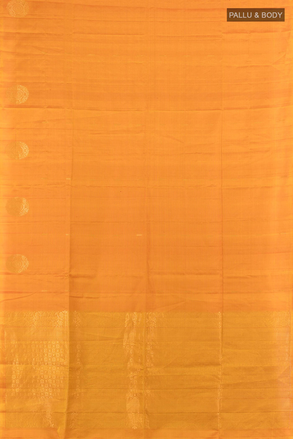 Flat view of Pure Silk Mustard Soft Saree with Zari Butta on the body and Without Border. 