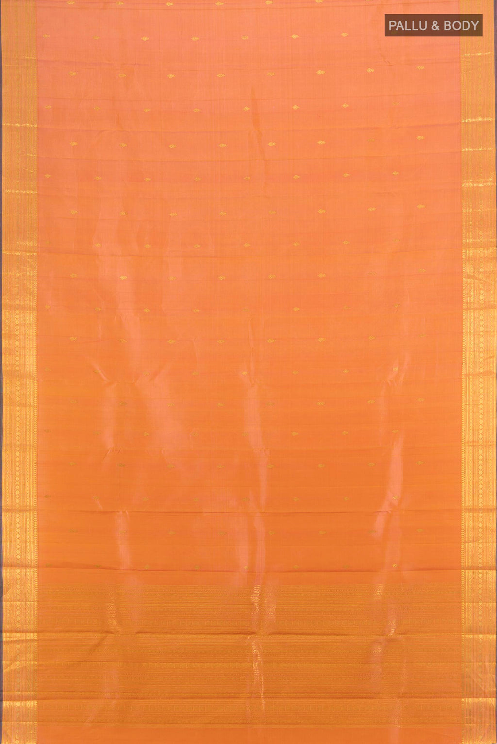 Flat view of Peach Dual Tone Kanjivaram Silk Saree with Zari Butta on the body and Zari Border. 