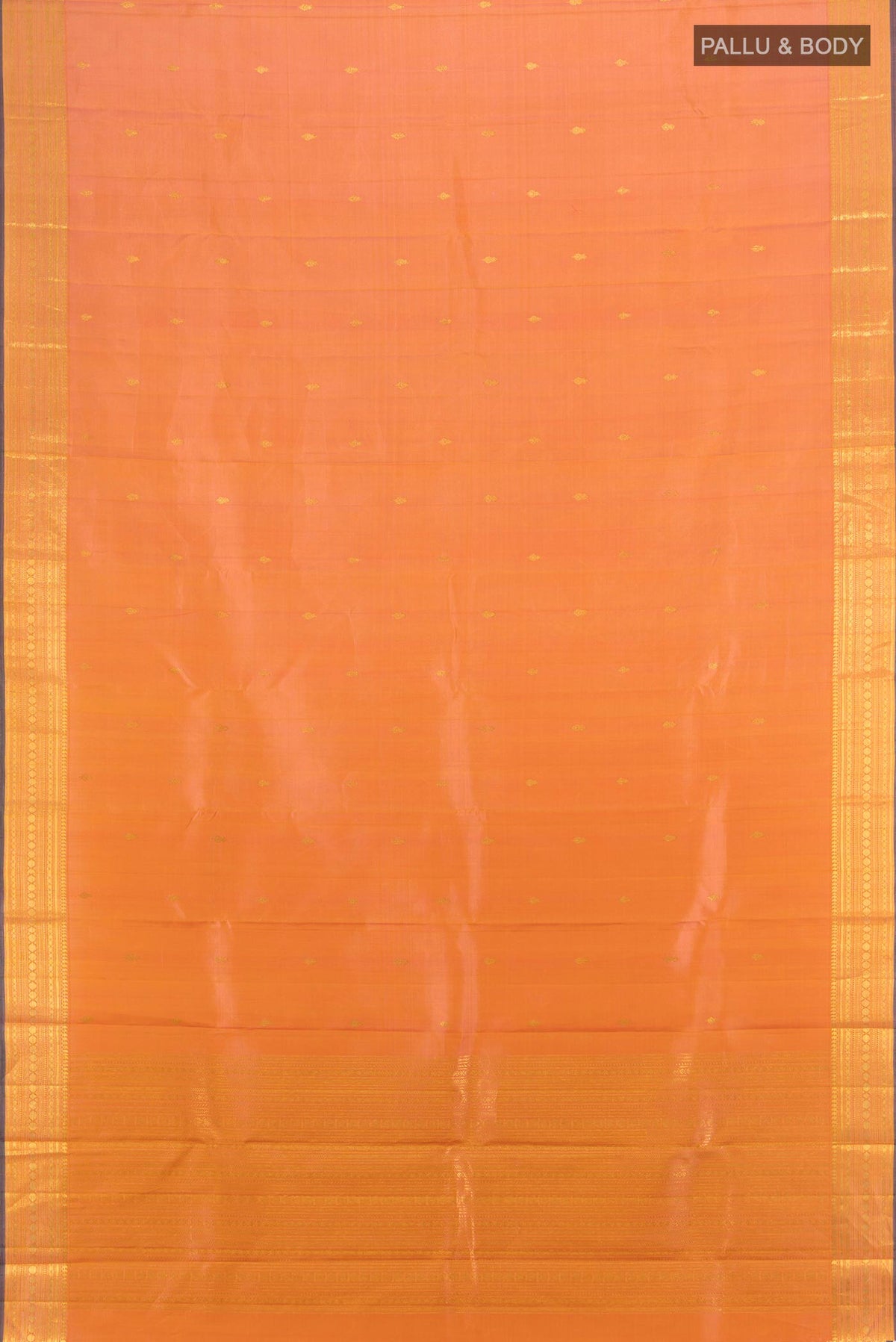 Flat view of Peach Dual Tone Kanjivaram Silk Saree with Zari Butta on the body and Zari Border. 