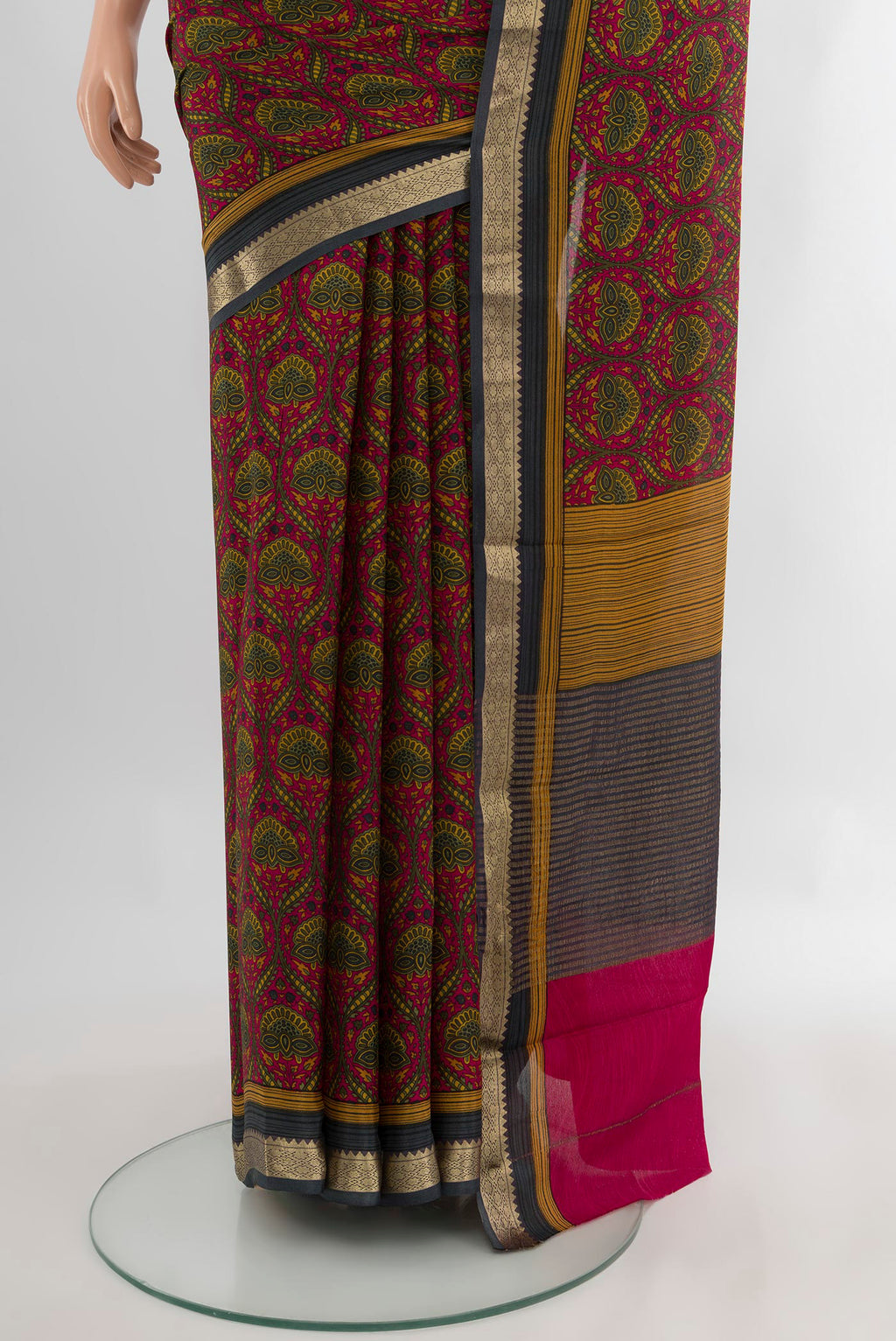 Pleats and pallu of Dark Pink Crepe Saree with Floral Print on the body and Zari Border. 
