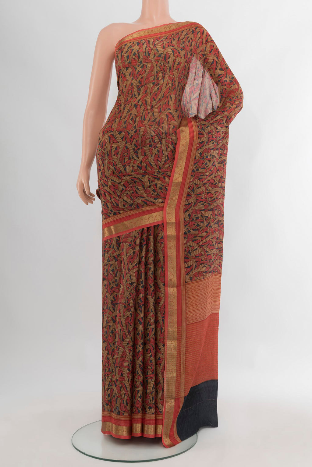 Multi Color Crepe Saree with Floral Print on the body and Zari Border.  displayed on a mannequin