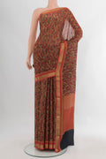 Multi Color Crepe Saree with Floral Print on the body and Zari Border.  displayed on a mannequin