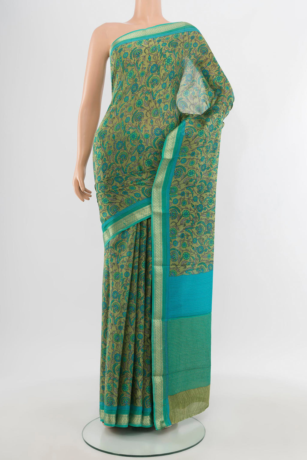 Multi Color Mysore Crepe Saree with Floral Print on the body and Zari Border.  displayed on a mannequin