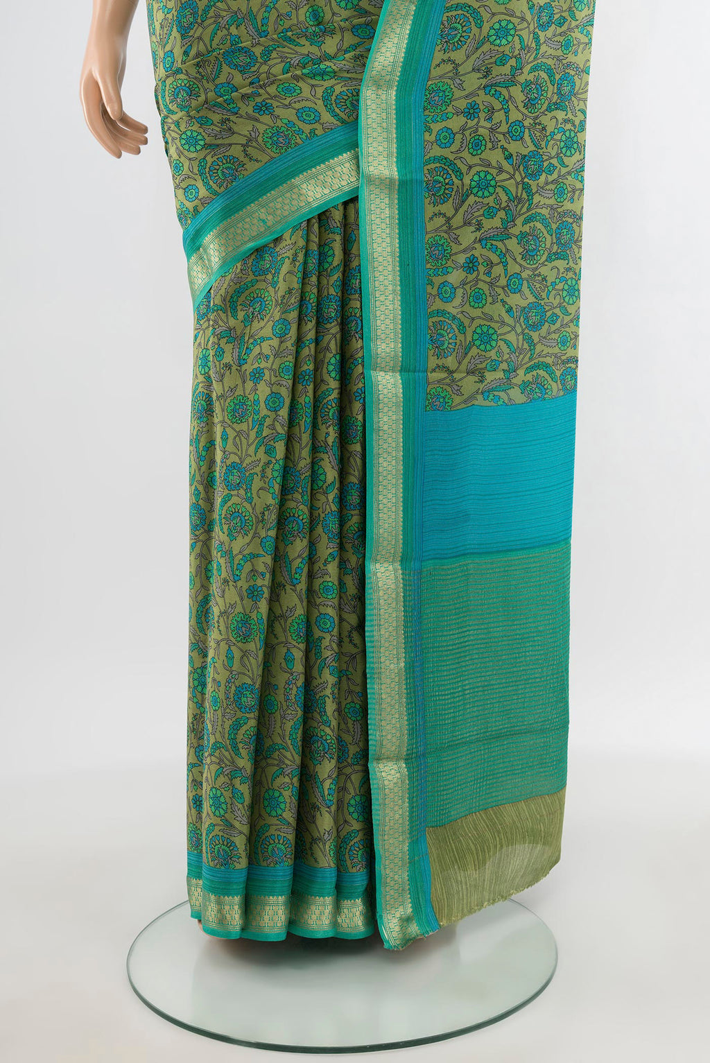 Pleats and pallu of Multi Color Mysore Crepe Saree with Floral Print on the body and Zari Border. 