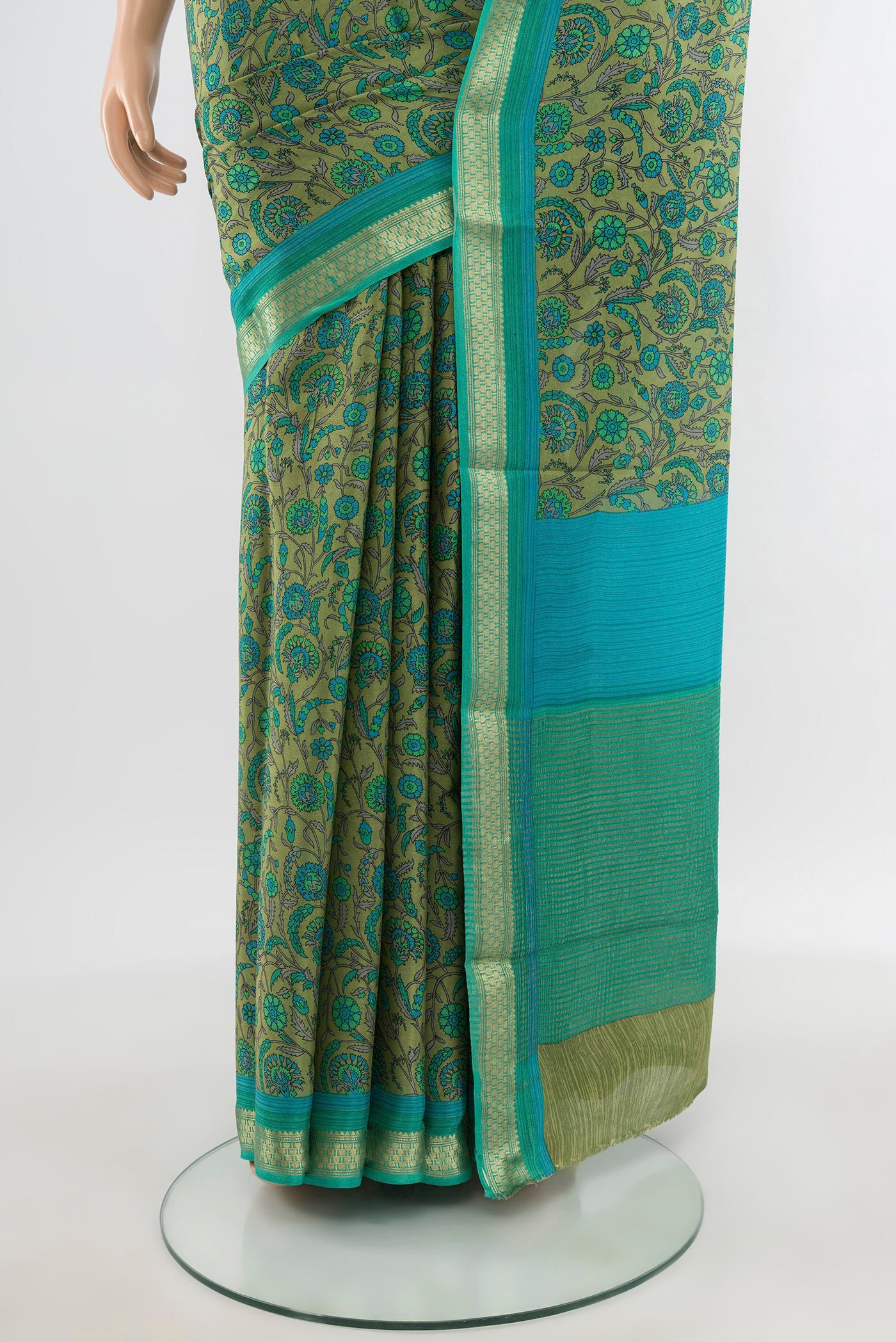Pleats and pallu of Multi Color Mysore Crepe Saree with Floral Print on the body and Zari Border. 