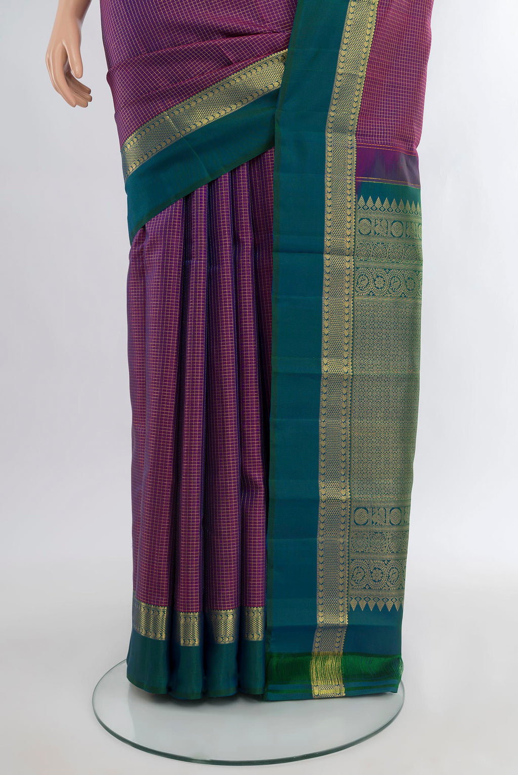 Pleats and pallu of Purple Kanjivaram Silk Saree with Checked design on the body and Zari Border. 