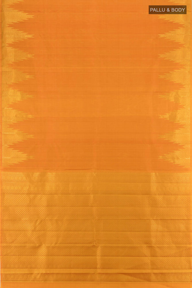 Flat view of Mustard Kanjivaram Silk Saree with Zari Butta on the body and Silk Border. 