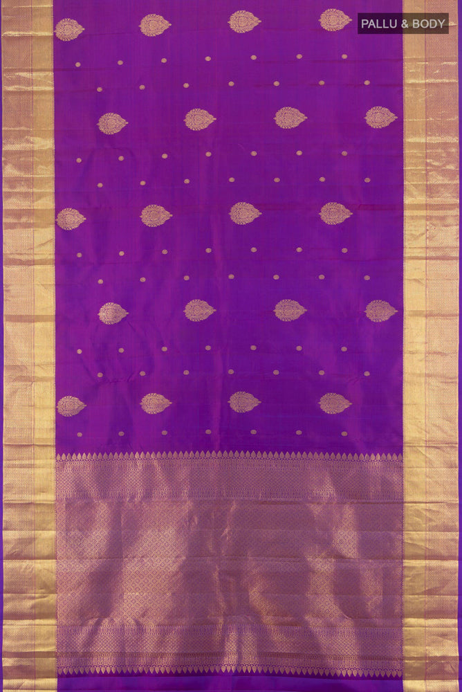 Flat view of Violet Kanjivaram Silk Saree with Zari Butta on the body and Silk Border. 