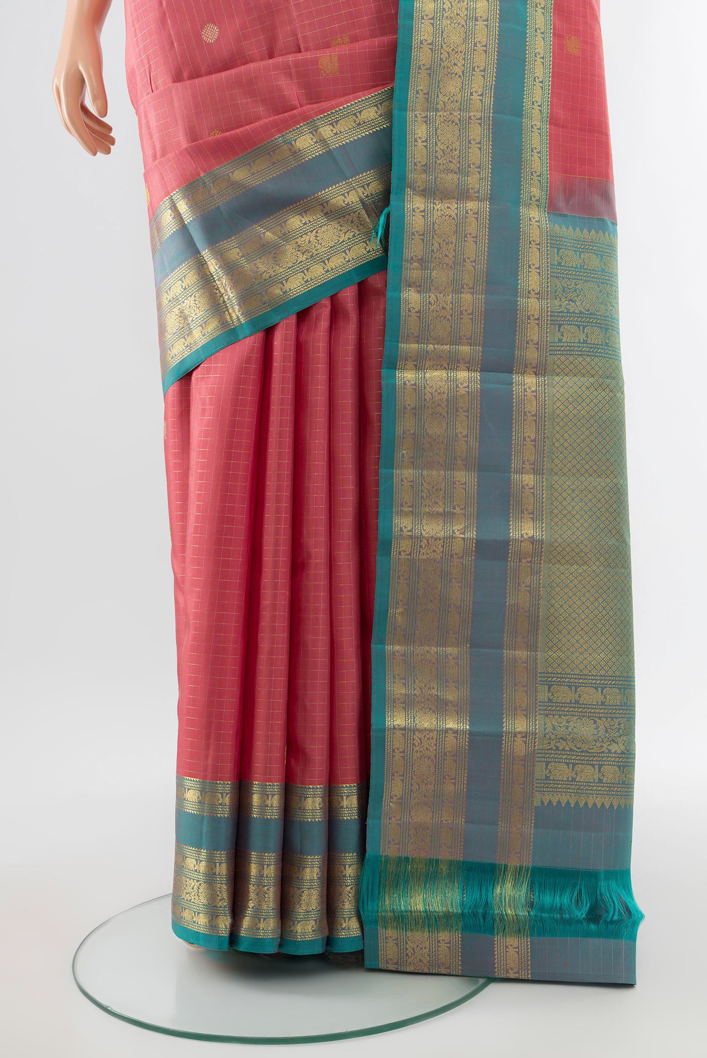 Pleats and pallu of Pure Silk Pure Zari Rose Gold Kanjivaram Saree with Zari Butta on the body and Silk Border. 