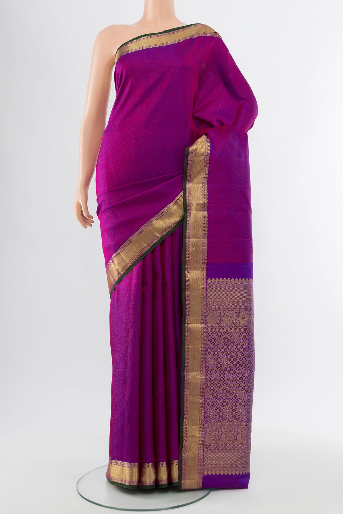 Purple Kanjivaram Silk Saree with Thread Brocade on the body and Silk Border.  displayed on a mannequin
