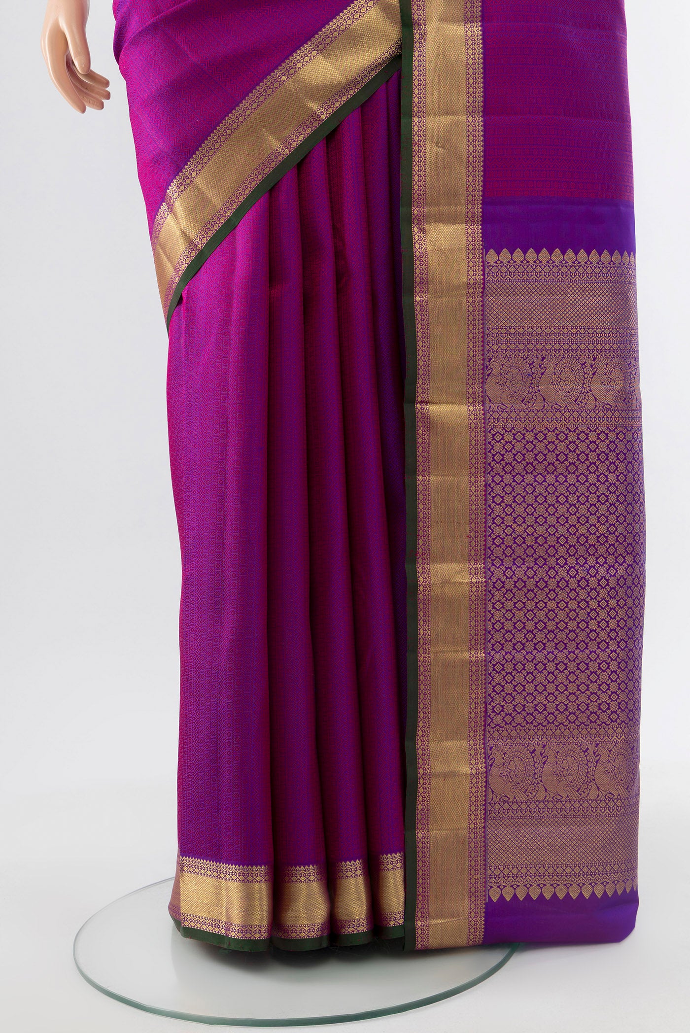 Pleats and pallu of Purple Kanjivaram Silk Saree with Thread Brocade on the body and Silk Border. 