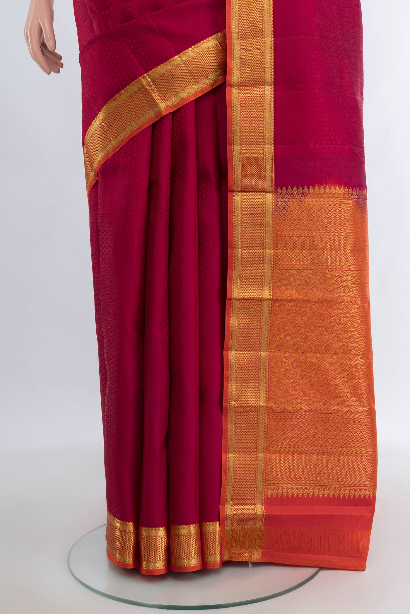 Pleats and pallu of Maroon Kanjivaram Silk Saree with Jacquard design on the body and Zari Border. 