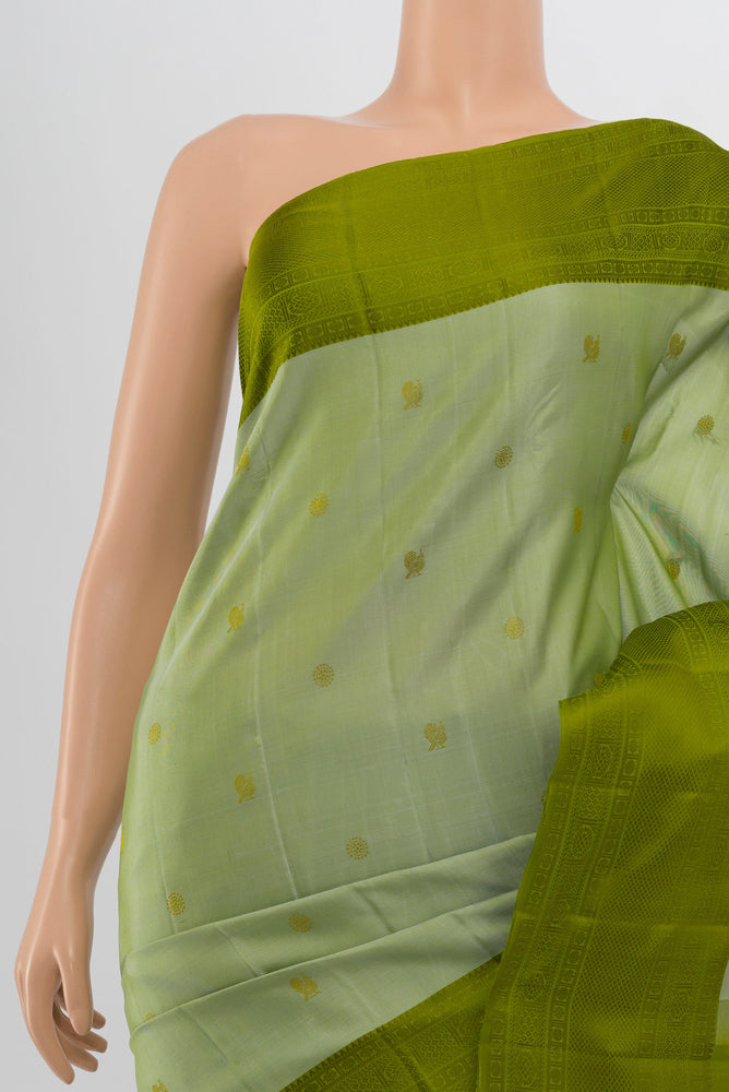 Border image of Light Green Kanchipuram Silk Saree with Zari Butta on the body and Silk Border. 