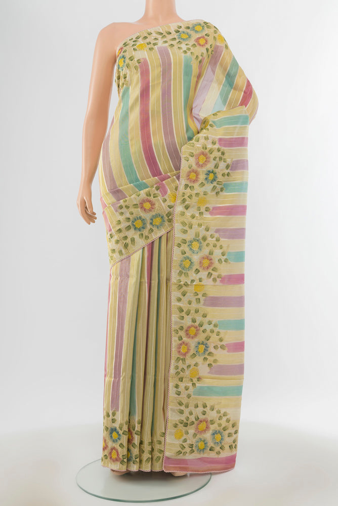 Pure Silk Pure Zari Multi Color Art Saree with Zari Butta on the body and Silk Border.  displayed on a mannequin