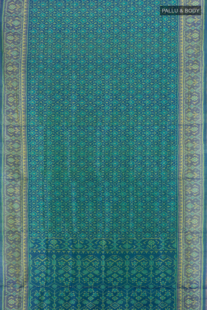 Flat view of Multi Color Rajkot Patola Silk Saree with Ikat Print on the body and Silk Border. 