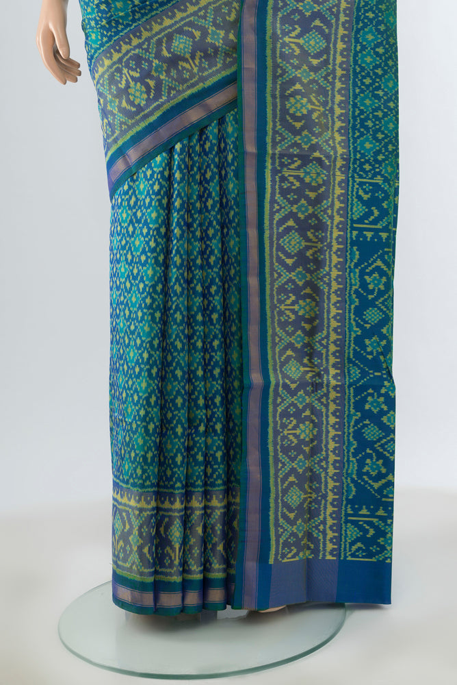Pleats and pallu of Multi Color Rajkot Patola Silk Saree with Ikat Print on the body and Silk Border. 