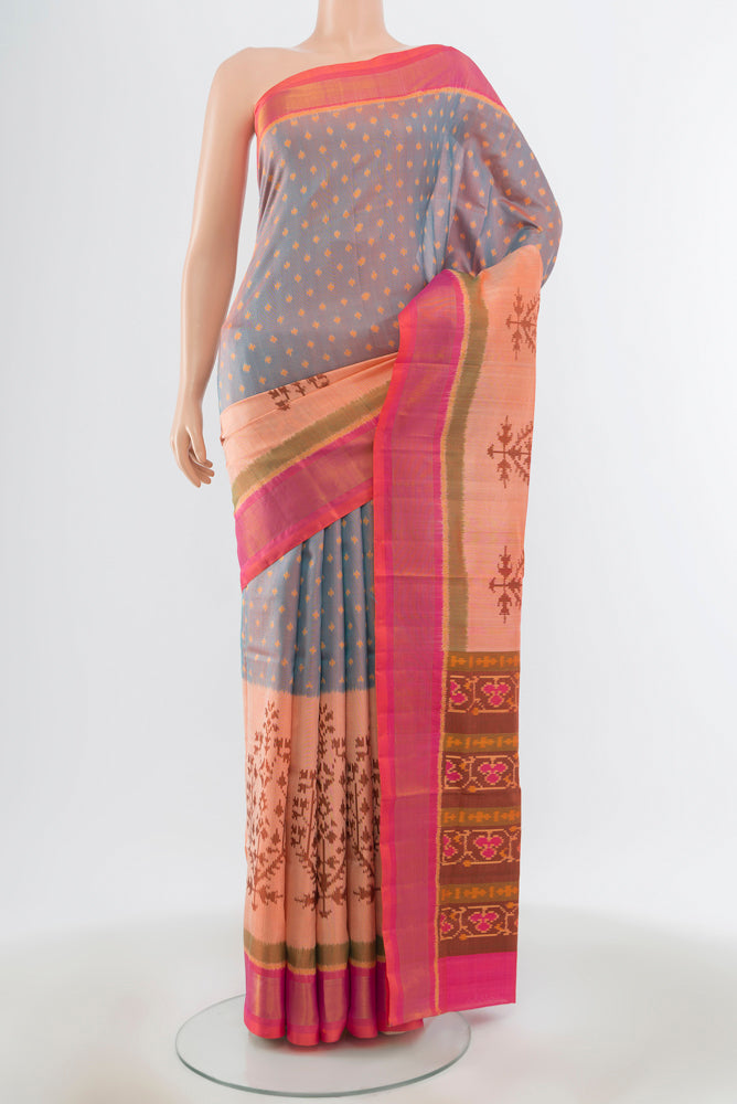 Multi Color Rajkot Patola Silk Saree with Ikat Print on the body and Silk Border.  displayed on a mannequin