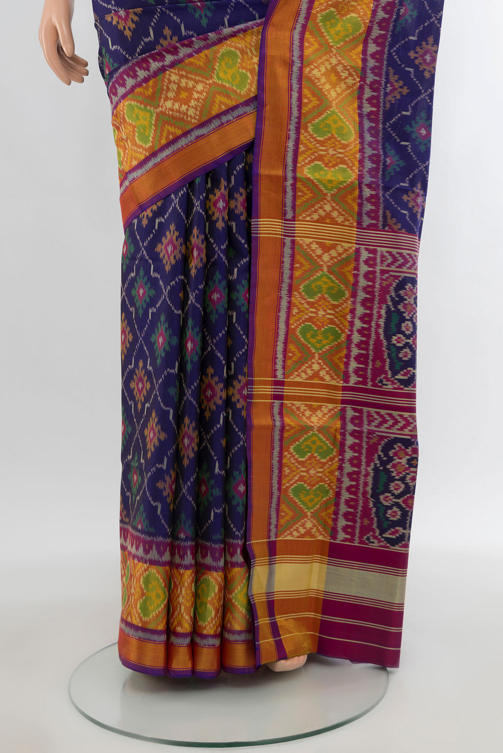 Pleats and pallu of Navy Blue Rajkot Patola Silk Saree with Pure Ikat on the body and Ikat Border. 