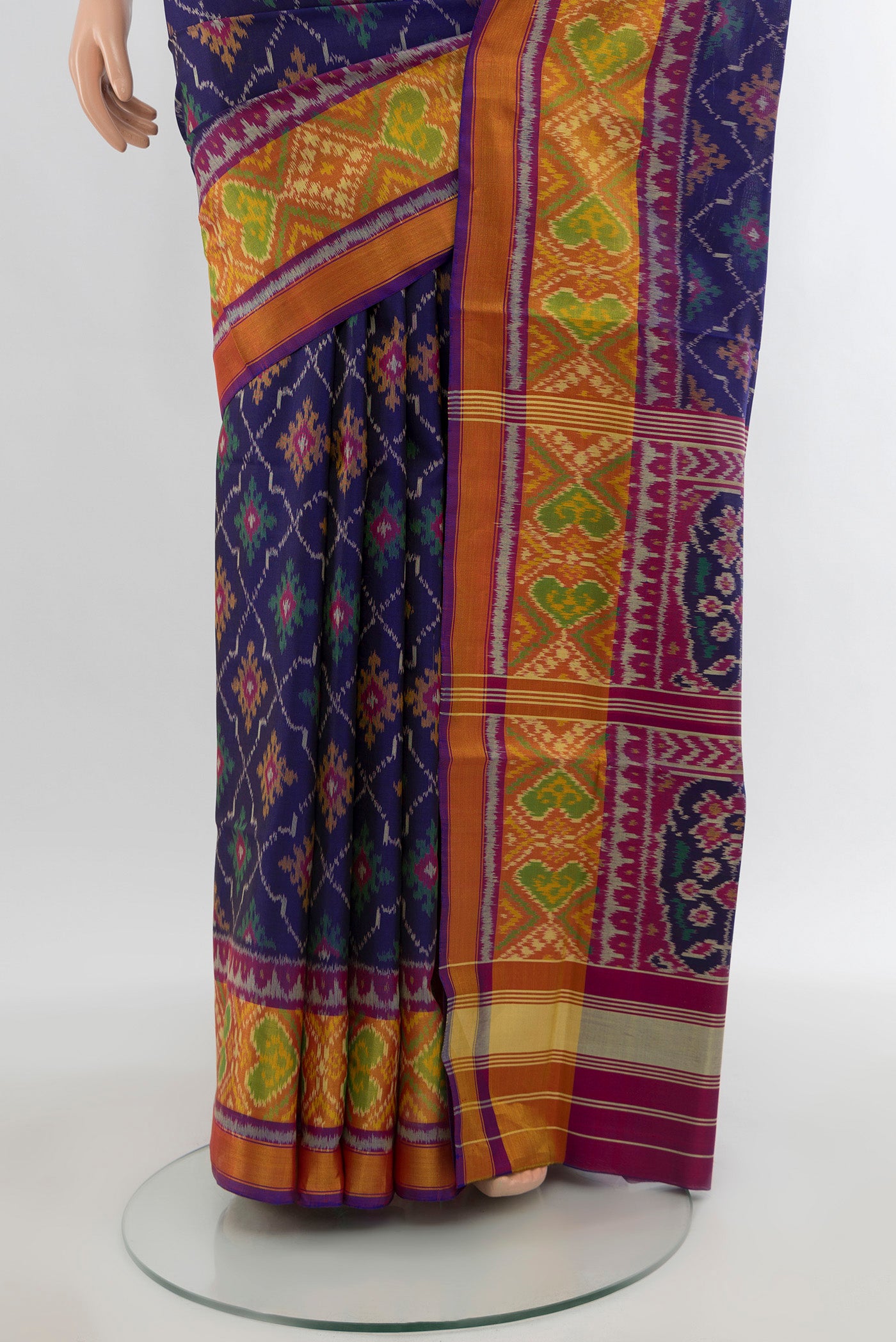 Pleats and pallu of Navy Blue Rajkot Patola Silk Saree with Pure Ikat on the body and Ikat Border. 