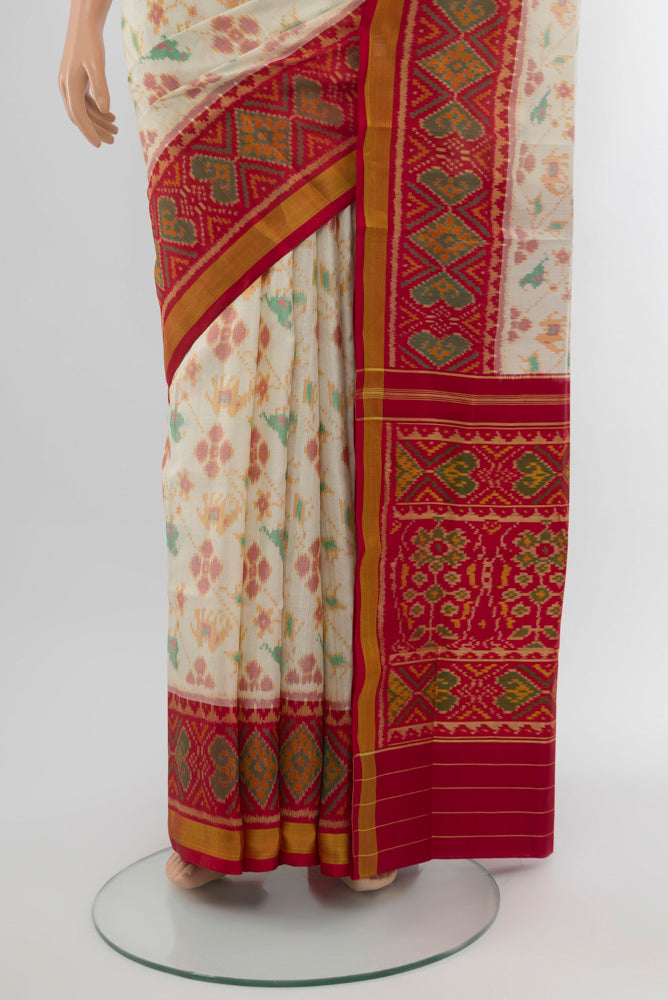 Pleats and pallu of Multi Color Rajkot Patola Silk Saree with Ikat Print on the body and Silk Border. 