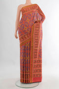 Pure Silk Multi Color Rajkot Patola Saree with Pure Ikat on the body and Ikat Border.  displayed on a mannequin