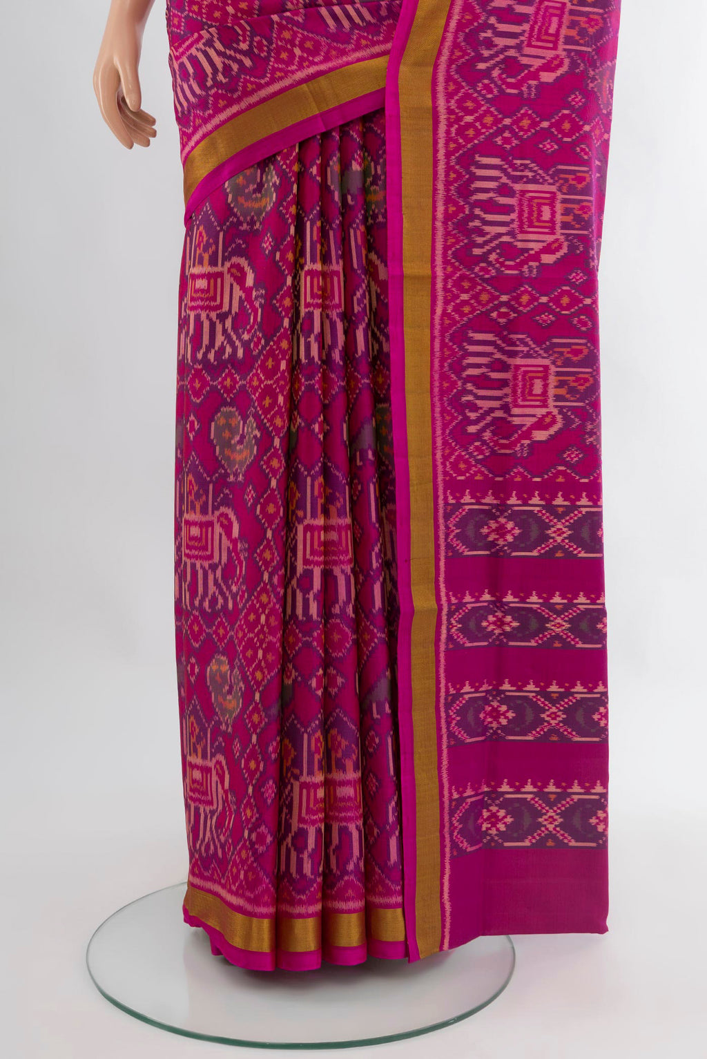 Pleats and pallu of Magenta Rajkot Patola Silk Saree with Pure Ikat on the body and Zari Border. 