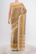 Multi Color Pochampally Saree with Ikat Print on the body and Silk Border.  displayed on a mannequin