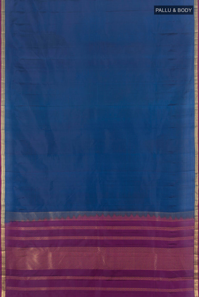 Flat view of Dark Blue Soft Silk Saree with Zari Butta on the body and Silk Border. 