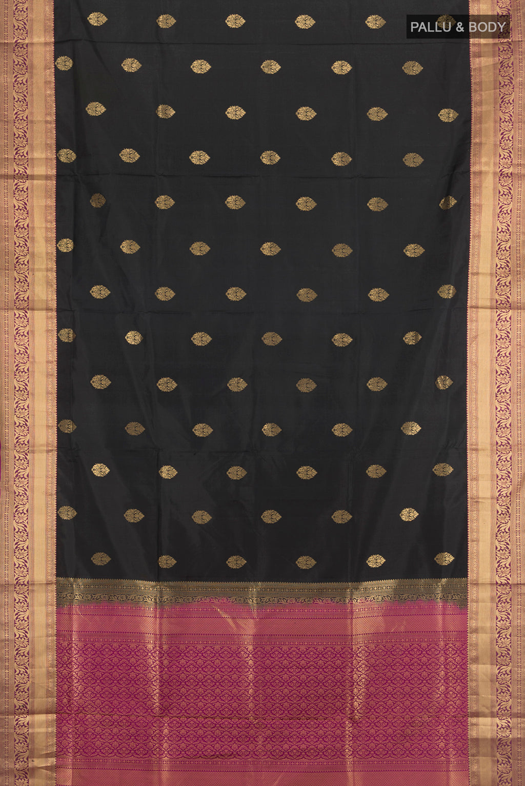 Flat view of Black Soft Silk Saree with Zari Butta on the body and Zari Border. 