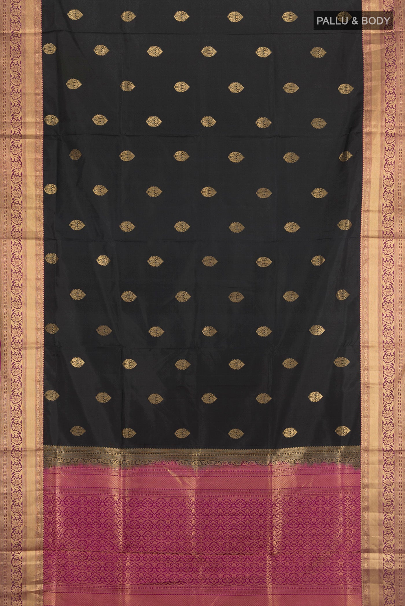 Flat view of Black Soft Silk Saree with Zari Butta on the body and Zari Border. 