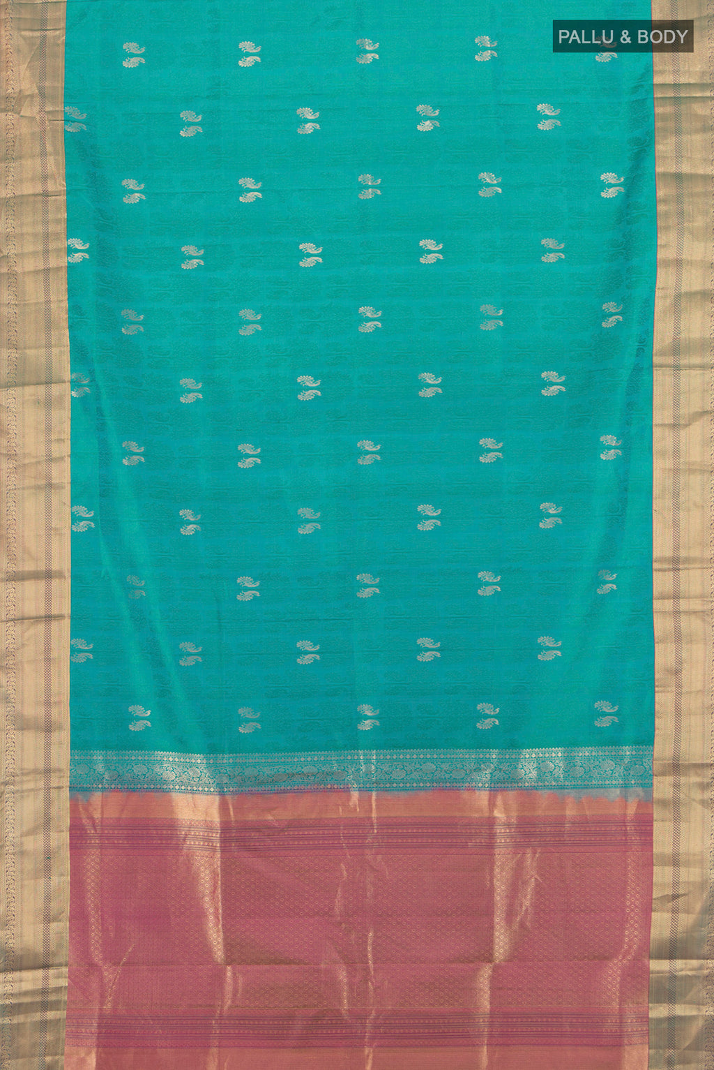 Flat view of Turquoise Soft Silk Saree with Jacquard With Zari Butta on the body and Zari Border. 