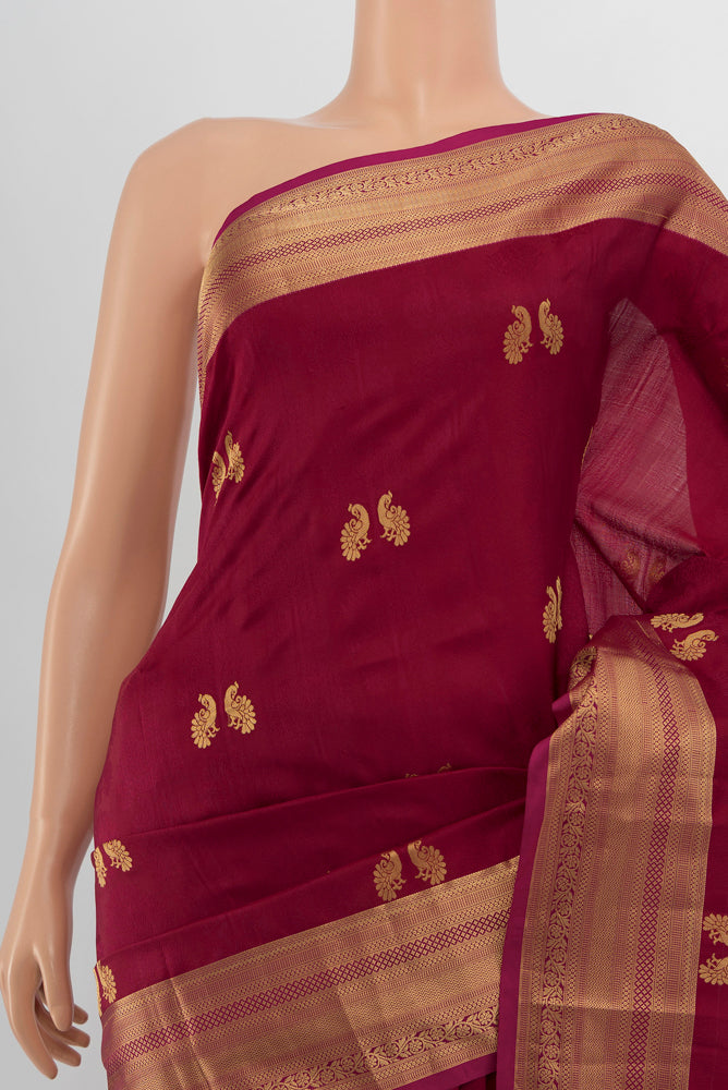 Border image of Maroon Soft Silk Saree with Zari Butta on the body and Silk Border. 
