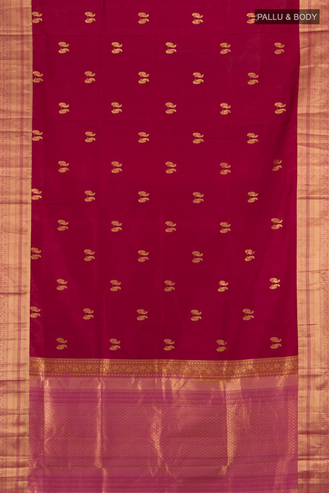 Flat view of Maroon Soft Silk Saree with Zari Butta on the body and Silk Border. 